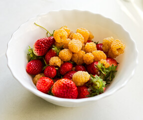 Fruit Bowl With Fresh Strawberries And Mulberries
