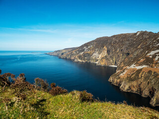 Stunning nature scenery of Slieve League cliff area, county Donegal, Ireland. Popular tourist area. Warm sunny day with blue sky.