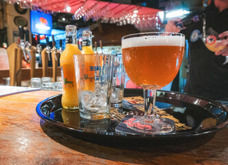 Classic bar or tavern in Brussels, tray with traditional beer and drinks.