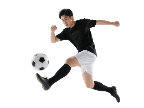 A male soccer player in dynamic motion kicking a soccer ball, showcasing athleticism and sportsmanship.