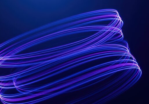 Abstract swirling lines of blue and purple light trails against a dark blue background, suggesting motion and technology