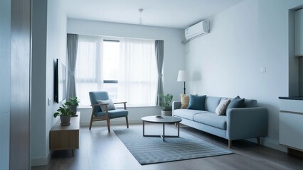A modern living room with light-colored sofa, chair, coffee table, rug, and large windows letting in natural light.