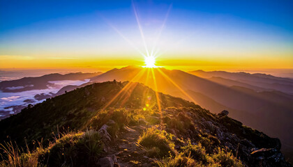 A Radiant Sunrise Breaking Over Mountain Peaks with Glowing Rays and Rolling Clouds Below