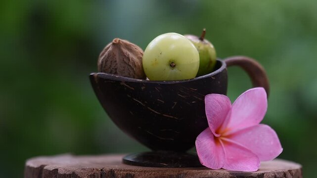 Indian Gooseberry ,terminalia chebula and terminalia bellirica fruits  on natural background.