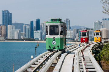 Haeundae Blue Line Park, Busan, ride on multicoloured sky capsule train, railway tram route from...