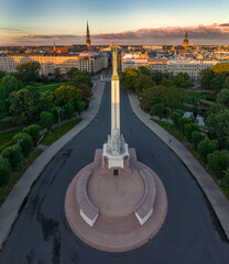 Birds eye view of the old city of Riga and statue of liberty - Milda.