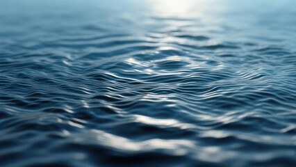 Naklejka premium Close-up of gently undulating water surface, showing texture and light reflection