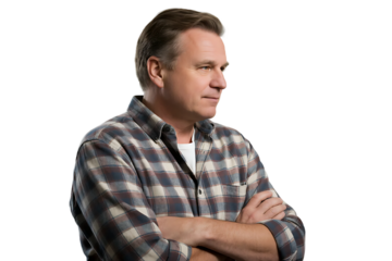 A middle-aged man in a plaid shirt with arms crossed, showcasing a casual and composed appearance.