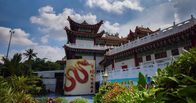 Kuala Lumpur, Malaysia &ndash; October 13, 2025: Time lapse of Thean Hou Temple courtyard decorated with hundreds of lanterns, visitors walking and clouds moving above