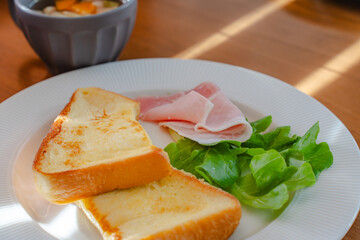 French toast breakfast with ham and soup

