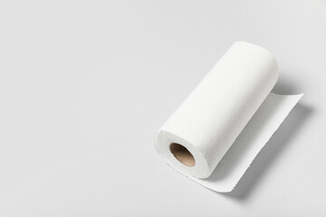 Roll of paper towels on grey background