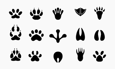Obraz premium a collection of sixteen different animal paw prints and tracks in black silhouettes against a white background.