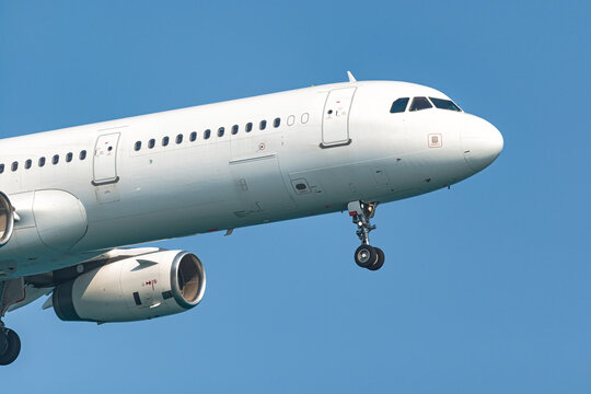 Lufthansa airbus a321 passenger airplane flying in blue sky