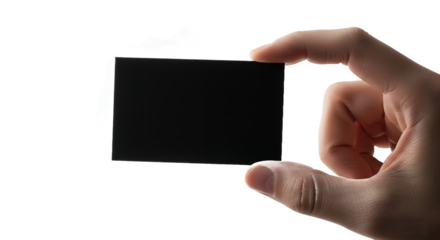 Hand Holding Blank Black Rectangular Card on Bright White Background with Copy Space, Ideal for Business Card Mockups, Professional Branding, Information Display, or Modern Corporate Presentation