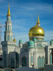 Moscow, Russia, October 01, 2025: Moscow Cathedral Mosque domes shining in sunlight.