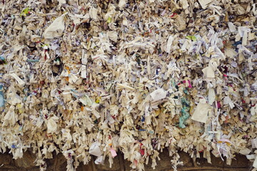 thousands of prayers and wishes stuffed into an outside wall near the house of the virgin Mary in  Turkey, Meryem Ana Evi