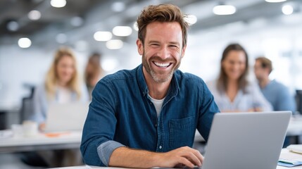 Young Businessman Smiling While Collaborating in Modern Office Space