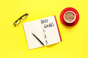 Notebook with empty to do list, eyeglasses and cup of coffee on yellow background. New year goals