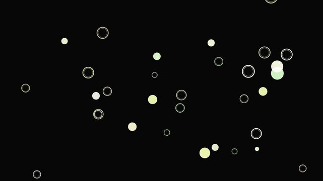 Abstract pattern of scattered circles and dots on a black background