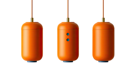 Three orange, cylindrical objects hanging from wires
