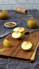Sliced Apples and Cinnamon on a Cutting Board