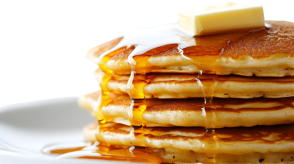 Stack of tasty pancakes with butter and maple syrup isolated on transparent background for breakfast meal