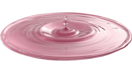 A single drop of pink liquid creates concentric ripples