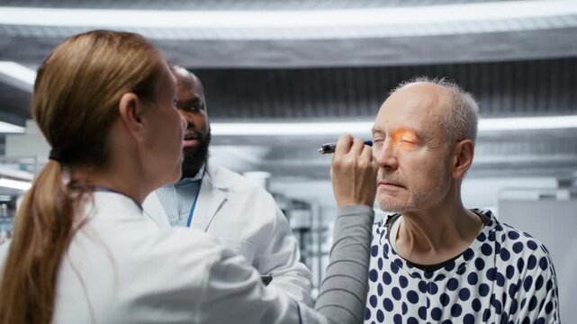 Healthcare expert review patient vitals during a laboratory drug trial, documenting dosage effects and outcomes for treatment safety and progress in biotechnology and biomedicine. Camera B.