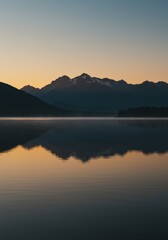 Fototapeta premium “Serene lake with mountain reflection at sunrise, calm water surface, soft golden light, peaceful natural landscape, perfect symmetry and stillness.”