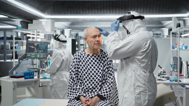 Black medic in quarantine facility provides medical care to patient during outbreak, collecting data on disease, drug treatment and vaccine testing for global epidemic prevention. Camera A.