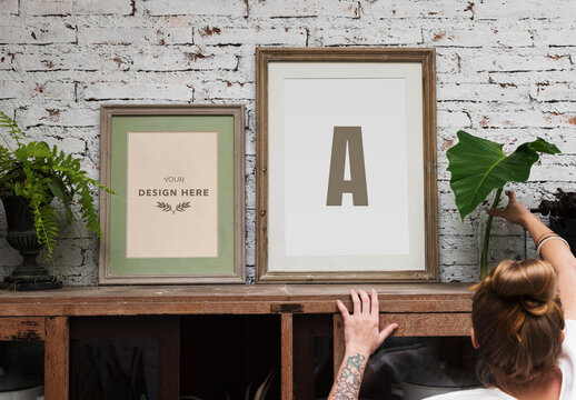 Woman Arranging Some Plants And Picture Frame Mockups