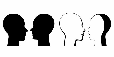 Two pairs of human head silhouettes facing each other in black and white contrast