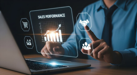 Business professional analyzes sales performance data on futuristic digital interface