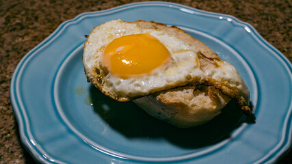 Delicious Sunny-Side Up Fried Egg on Crusty Toasted Bread