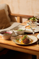 A Delicious Spread of Authentic Asian Cuisine Beautifully Arranged on a Wooden Table