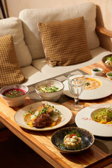 Indulge in a Gourmet Dining Experience while enjoying a Cozy Table Setting with loved ones