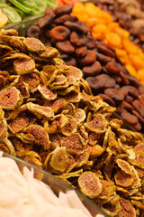 Dried fruit display at a local market in the afternoon