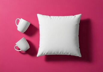 White square cushion with two coffee cups on pink background