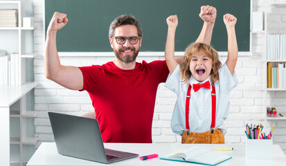 Excited school kid and teacher learning study in class. Education and knowledge.