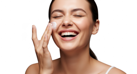 Happy woman applying skincare cream on face, smiling with eyes closed, isolated on transparent background