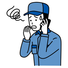 スマートフォンでの通話で困惑するつなぎ作業服の男性