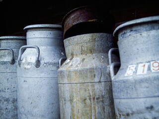 Obraz premium Old rusty light blue Melkkan milk gallons, Amsterdam, Netherlands