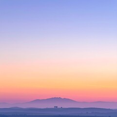 Fototapeta premium Pastel sunrise over hills