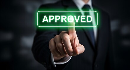 Businessman's Finger Presses Glowing Green ' APROVED' Button on Digital Interface approved