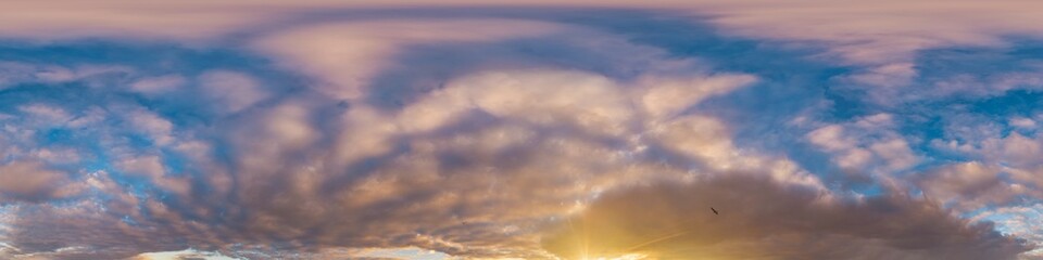 Obraz premium Sunset sky with bright glowing pink Cumulus clouds. Seamless spherical HDR 360 panorama. Full zenith or sky dome in 3D, sky replacement for aerial drone panoramas. Climate and weather change.