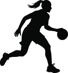 Silhouette of a female basketball player dribbling during game action