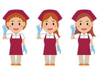 OKサインを出し、笑顔の真紅のエプロンの女性清掃員。その2