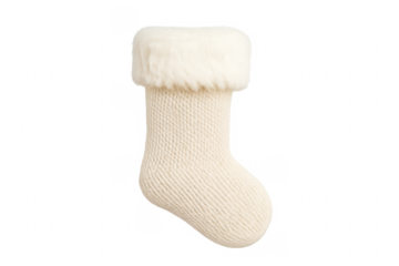 White knitted christmas stocking hanging with fur cuff