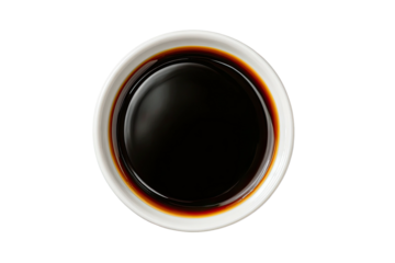 Dark soy sauce in small white bowl