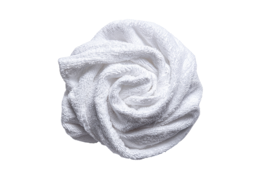 Rolled white towel shaped like a rose